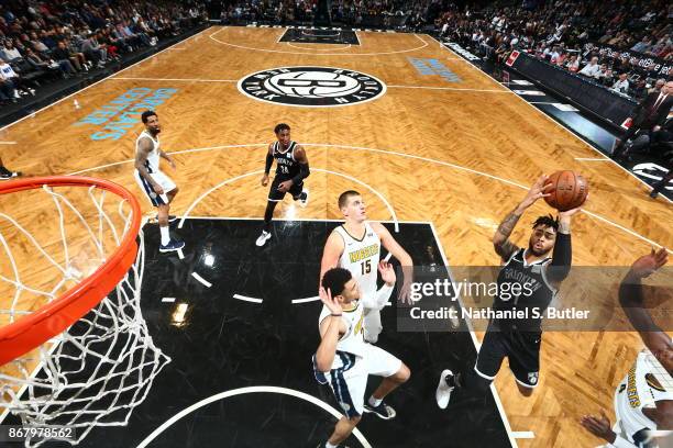 Angelo Russell of the Brooklyn Nets shoots the ball against the Denver Nuggets on October 29, 2017 at Barclays Center in Brooklyn, New York. NOTE TO...