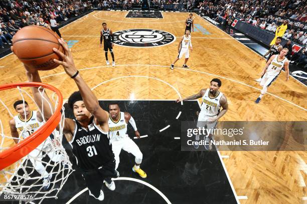 Jarrett Allen of the Brooklyn Nets shoots the ball against the Denver Nuggets on October 29, 2017 at Barclays Center in Brooklyn, New York. NOTE TO...