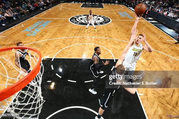 Nikola Jokic of the Denver Nuggets shoots the ball against the Brooklyn Nets on October 29, 2017 at Barclays Center in Brooklyn, New York. NOTE TO...