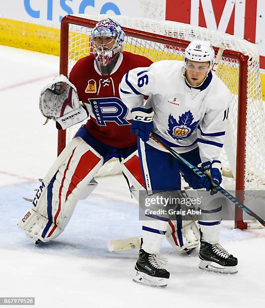 Kerby Rychel of the Toronto Marlies puts a screen on Charlie Lindgren of the Laval Rocket during AHL game action on October 28, 2017 at Ricoh...