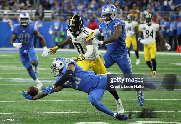 Darius Slay of the Detroit Lions breaks up a pass against the Pittsburgh Steelers during the first half at Ford Field on October 29, 2017 in Detroit,...