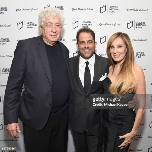 Avi Lerner, honoree Brett Ratner and Cindy Cowan attend the Jewish National Fund Los Angeles Tree Of Life Dinner at Loews Hollywood Hotel on October...