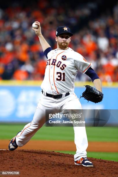 Collin McHugh of the Houston Astros throws a pitch during the fifth inning against the Los Angeles Dodgers in game five of the 2017 World Series at...