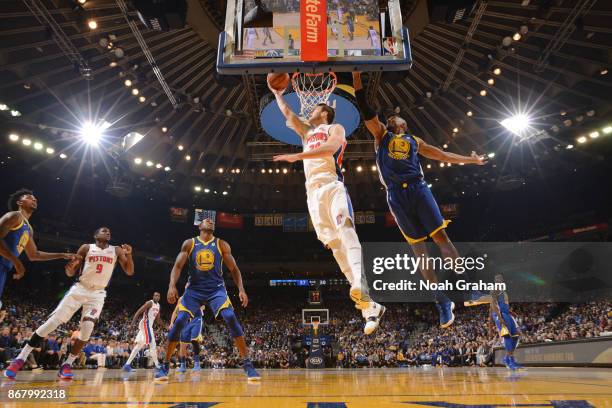 Jon Leuer of the Detroit Pistons goes to the basket against the Golden State Warriors on October 29, 2017 at ORACLE Arena in Oakland, California....