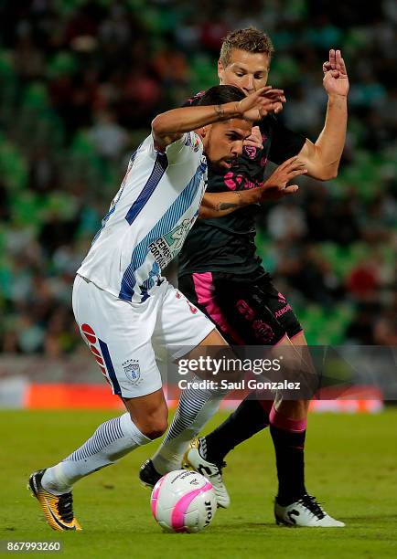 Franco Jara of Pachuca and Julio Furch of Santos fight for the ball during the 15th round match between Santos Laguna and Pachuca as part of the...