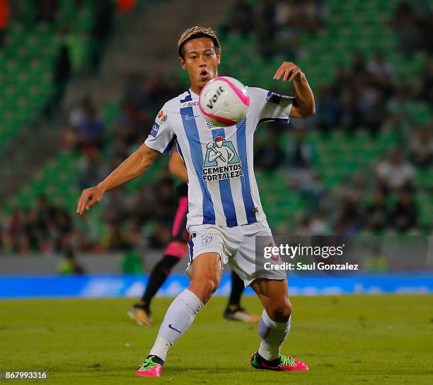 Keisuke Honda of Pachuca fights for the ball during the 15th round match between Santos Laguna and Pachuca as part of the Torneo Apertura 2017 Liga...