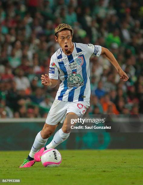 Keisuke Honda of Pachuca drives the ball during the 15th round match between Santos Laguna and Pachuca as part of the Torneo Apertura 2017 Liga MX at...