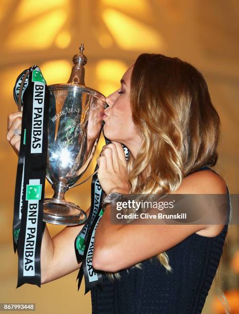 Champion Caroline Wozniacki of Denmark poses with the Billie Jean King trophy after her victory against Venus Williams of the United States in the...