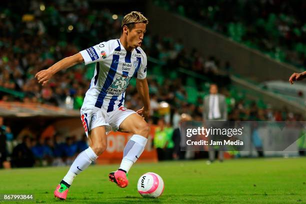 Keisuke Honda of Pachuca plays the ball during the 15th round match between Santos Laguna and Pachuca as part of the Torneo Apertura 2017 Liga MX at...