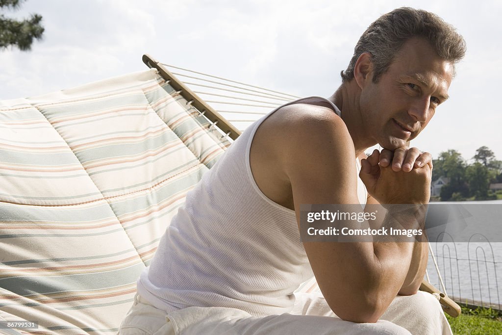 Man sitting in a hammock