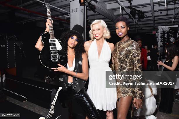 Imaan Hammam, Karlie Kloss and Maria Borges at the 2017 amfAR & The Naked Heart Foundation Fabulous Fund Fair at the Skylight Clarkson Sq on October...