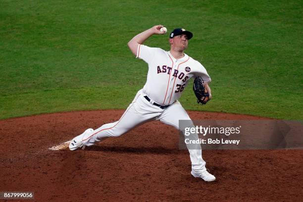 Will Harris of the Houston Astros throws a pitch during the eighth inning against the Los Angeles Dodgers in game five of the 2017 World Series at...