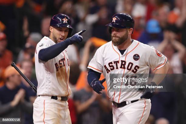 Brian McCann of the Houston Astros rounds the bases after hitting a solo home run during the eighth inning against the Los Angeles Dodgers in game...