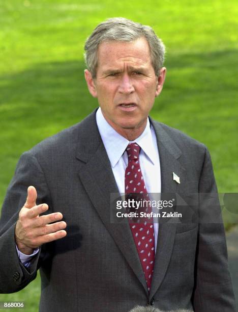 President George W. Bush speaks to the news media before departing the White House June 28, 2002 in Washington, D.C. Bush is scheduled to undergo a...