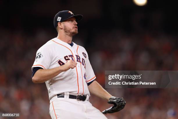 Brad Peacock of the Houston Astros reacts during the seventh inning against the Los Angeles Dodgers in game five of the 2017 World Series at Minute...