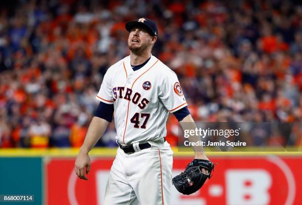 Chris Devenski of the Houston Astros looks on during the ninth inning against the Los Angeles Dodgers in game five of the 2017 World Series at Minute...