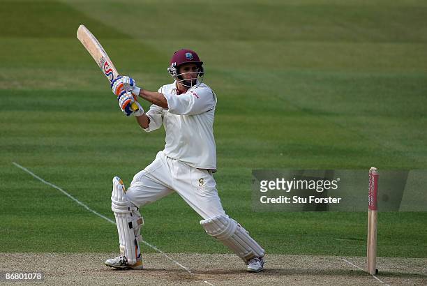 West Indian batsman Brendan Nash cuts a ball towards the boundary during day three of the 1st npower Test match between England and West Indies at...