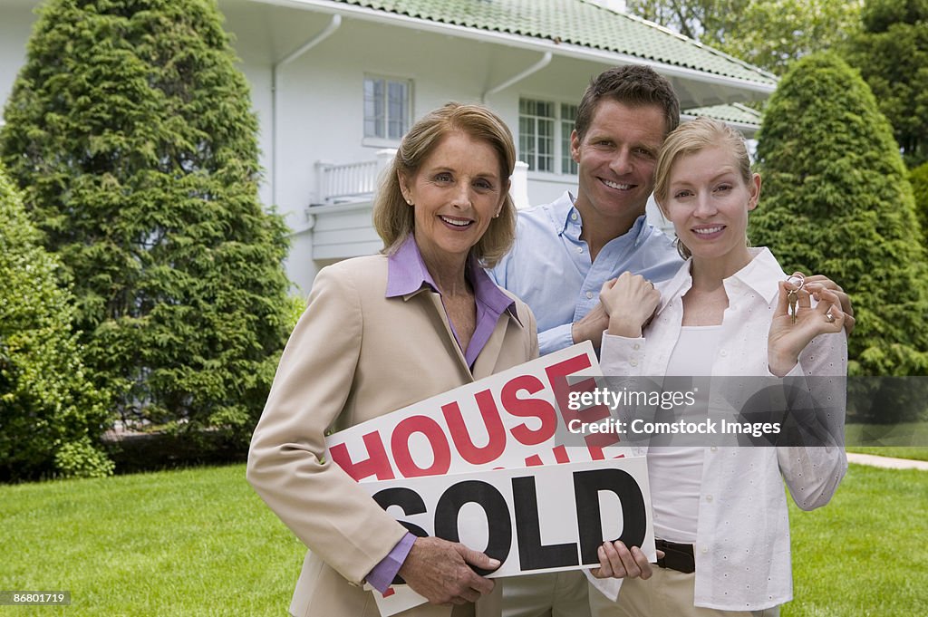 Couple with a real estate agent