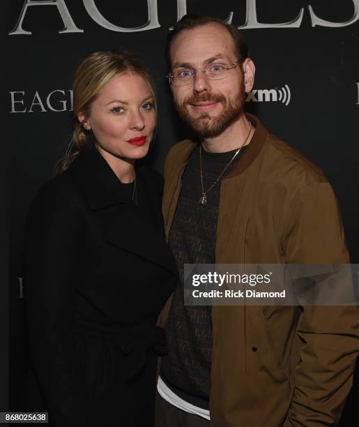 Actress Kaitlin Doubleday and SiriusXM's Rude Jude attend SiriusXM presents the Eagles in their first ever concert at the Grand Ole Opry House on...