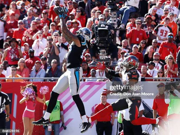 Wide Receiver Kelvin Benjamin of the Carolina Panthers makes a catch for a touchdown over Safety Justin Evans of the Tampa Bay Buccaneers at Raymond...