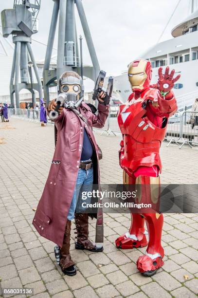 Cosplayer in character as Peter Quill Star-Lord,and one as Iron Man seen during day 3 of the MCM London Comic Con 2017 held at the ExCel on October...