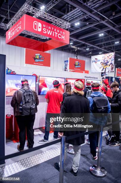 Cosplayers in character costumes learn how to fight with lightsabers during Day 3 of the MCM London Comic Con 2017 held at the ExCel on October 29,...