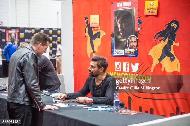 Fans meeting Manu Bennett during Day 3 of the MCM London Comic Con 2017 held at the ExCel on October 29, 2017 in London, England.