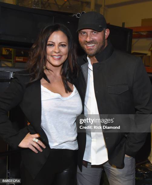 Sara Evans and Jay Barker attend SiriusXM presents the Eagles in their first ever concert at the Grand Ole Opry House on October 29, 2017 in...