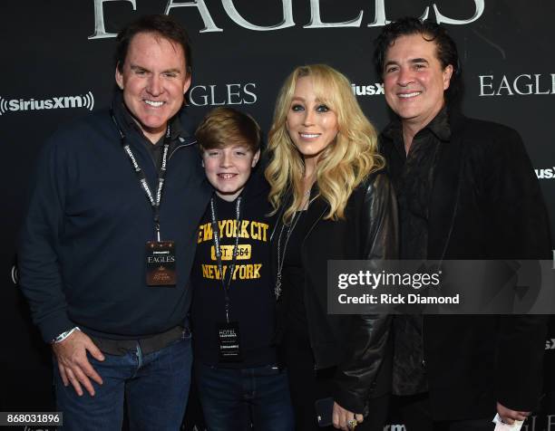 Brian Philips and Son with Scott Borchetta and Sandi Spika Borchetta of the Big Machine Label Group attend SiriusXM presents the Eagles in their...