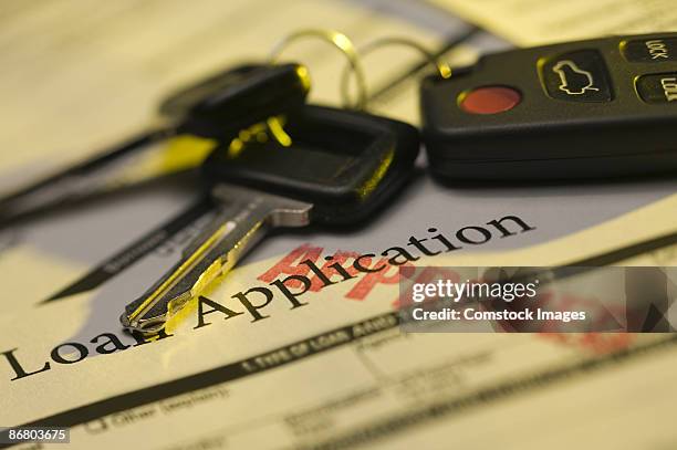 car keys and approved loan application - auto loan stock pictures, royalty-free photos & images