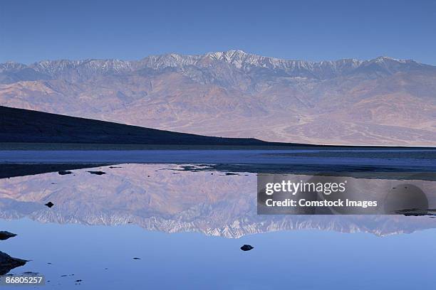 telescope peak reflected in pool at badwater - panamint range stock pictures, royalty-free photos & images