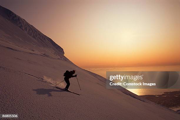 skier skiing down snaefells jokull volcano - olafsvik stock pictures, royalty-free photos & images