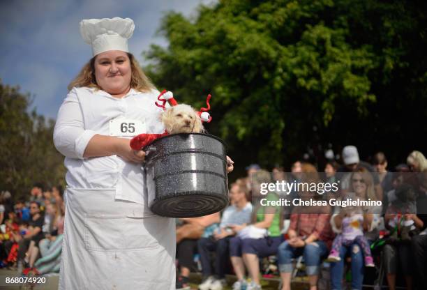 Participants dressed as a chef and a lobster seen during the Haute Dog Howl'oween Parade on October 29, 2017 in Long Beach, California.