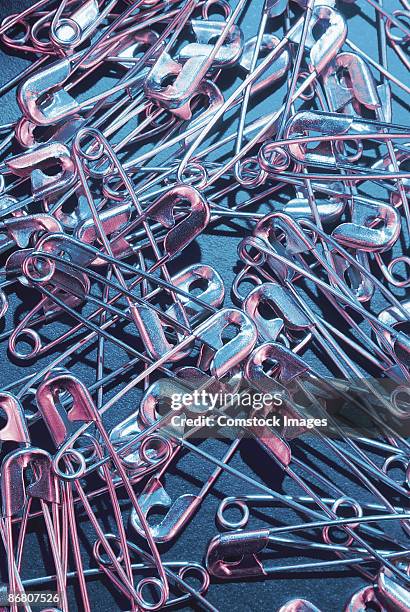 safety pins - colored safety pins stock pictures, royalty-free photos & images
