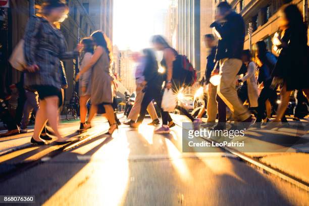 crossing people - traffic at rush hour - toronto stock pictures, royalty-free photos & images