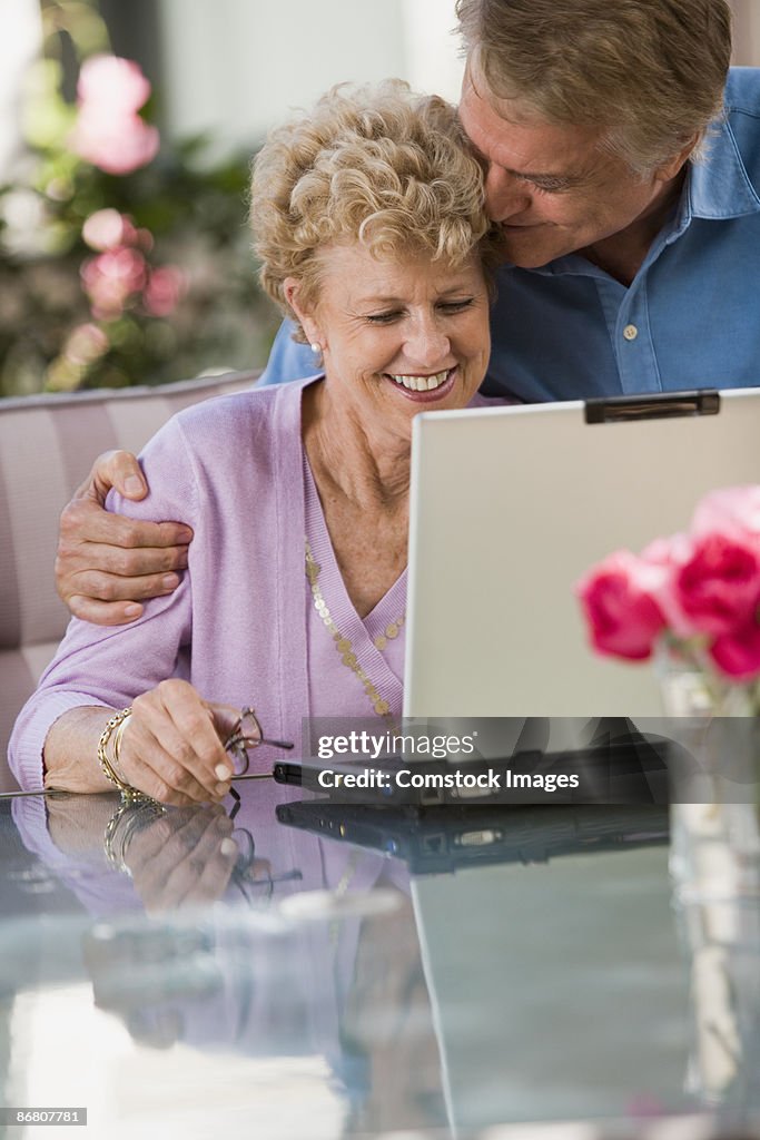 Couple on a laptop computer