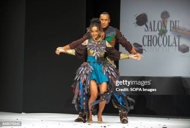 Lucie Vagenheim and Laurent Maistret wearing the dress of Cassandra Allaire and Jean Luc Decluzeau during the 23nd Chocolate Fair 2017 fashion show...