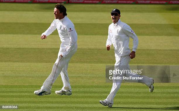 England bowler Graeme Swann celebrates with Kevin Pietersen after taking the wicket of West Indian batsman Sulieman Benn during day three of the 1st...