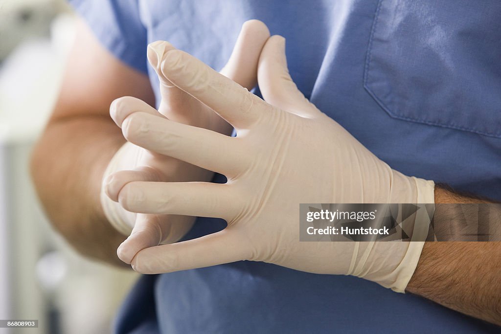 Close-up of surgeon's hands with gloves