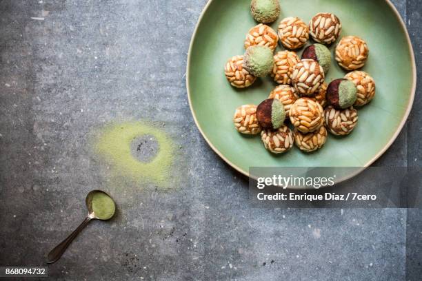 catalan panellets decorated with matcha - panellets fotografías e imágenes de stock
