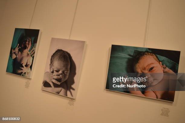 Photographs by Turkish photographer Ipek Ugural are seen on the closing day of the '30 Doradus - Stars on Earth from Birth' Photography Exhibition at...