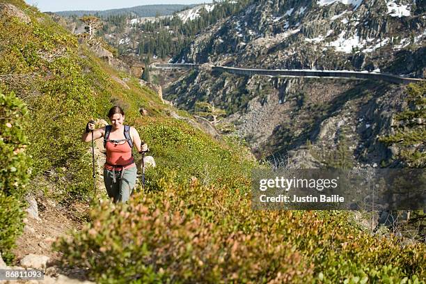 young woman hiking near donner pass, ca. - donner pass stock pictures, royalty-free photos & images