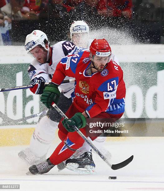 Alexander Radulov of Russia is challenged by David Backes of USA during the IIHF World Championship Semi-Final between USA and Russia at the...