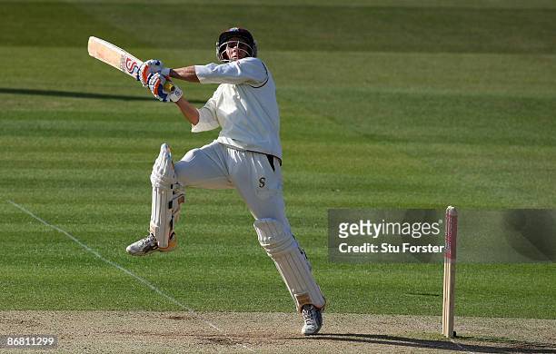 West Indian batsman Brendan Nash cuts a ball towards the boundary only to be caught during day three of the 1st npower Test match between England and...