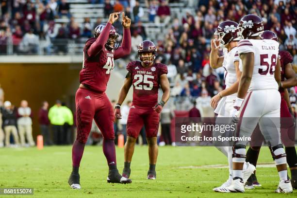 Texas A&M Aggies linebacker Mark Wagner celebrates a big hit on Mississippi State Bulldogs quarterback Nick Fitzgerald during the football game...