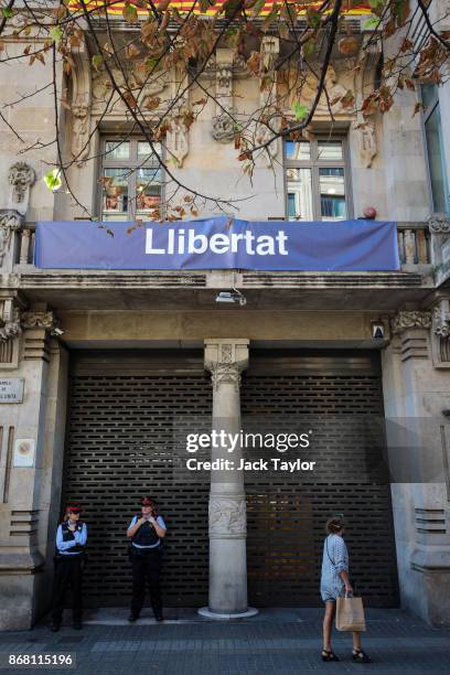 Catalan police officers stand in front of the Department of the Catalan Vice President on October 30, 2017 in Barcelona, Spain. The Spanish...