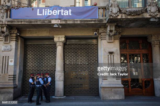 Catalan police officers stand in front of the Department of the Catalan Vice President on October 30, 2017 in Barcelona, Spain. The Spanish...