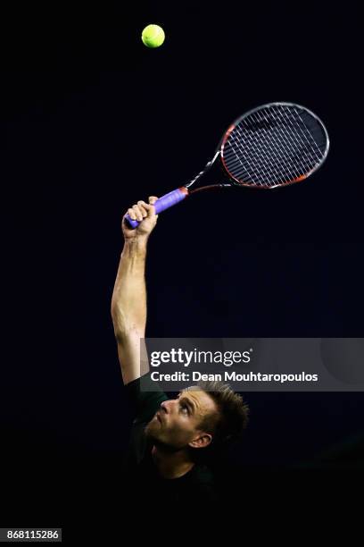 Peter Gojowczyk of Germany competes gainst Ryan Harrison of the USA during Day 1 of the Rolex Paris Masters held at the AccorHotels Arena on October...