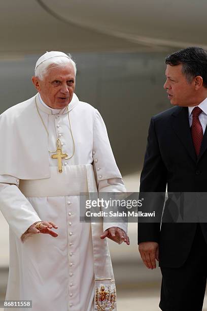 Pope Benedict XVI is welcomed by King Abdullah of Jordanon his arrival on May 8, 2009 in Amman, Jordan. Pope Benedict XVI is on his first trip to the...