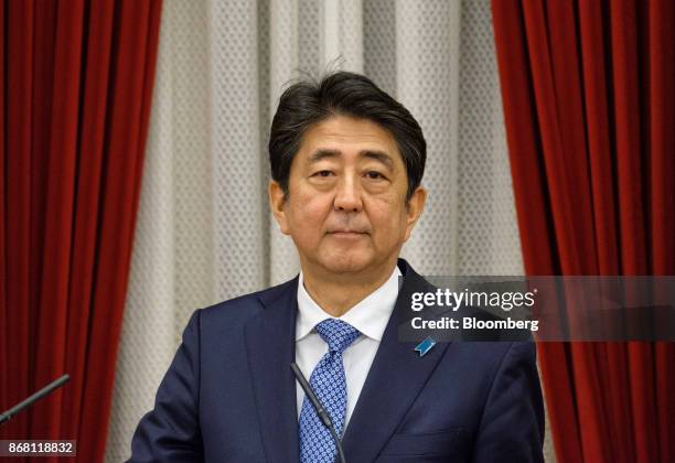 Shinzo Abe, Japan's prime minister, pauses during a speech before a dinner with Rodrigo Duterte, the Philippines' president, hosted by Abe and his...